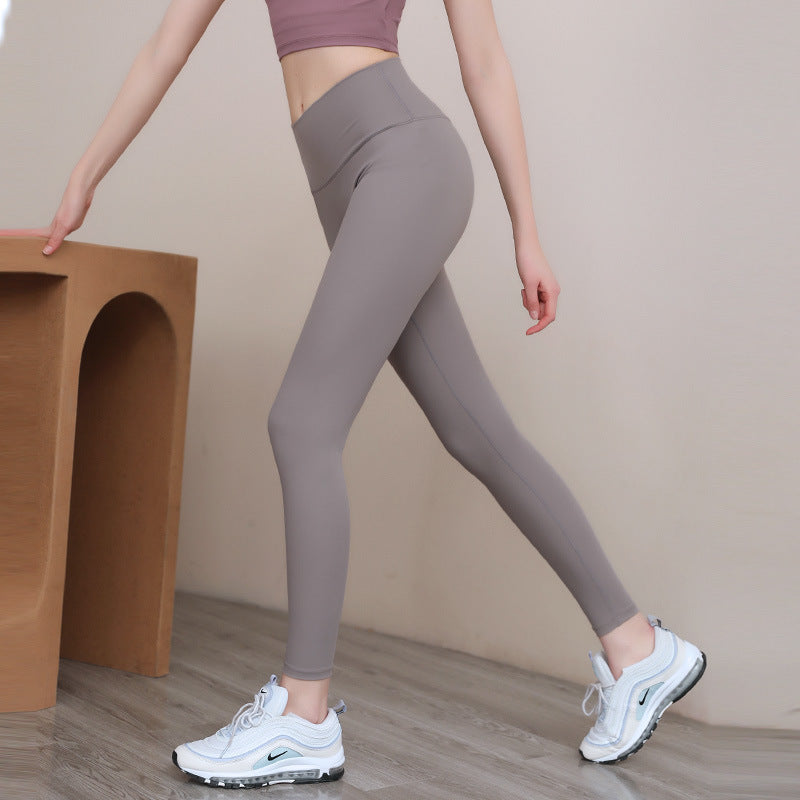 Peach Hip Fitness Pants - High-Waist Sports Leggings for Running & Hip Training